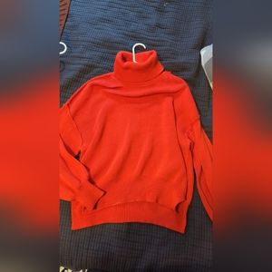 Red oversized turtleneck